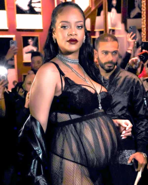 Pregnant Rihanna in thong, bra and net skirt