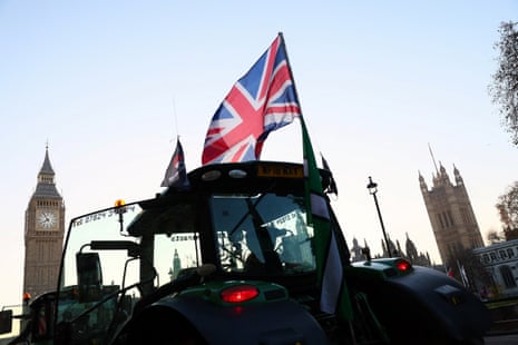 A tractor flies a Union Jack Flag near the the Elizabeth Tower this morning