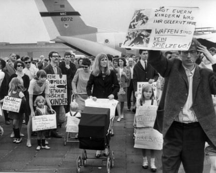 Families demonstrate at Berlin’s Tempelhof airport against the war in Vietnam, with Gudrun Ensslin, centre. July 1967.