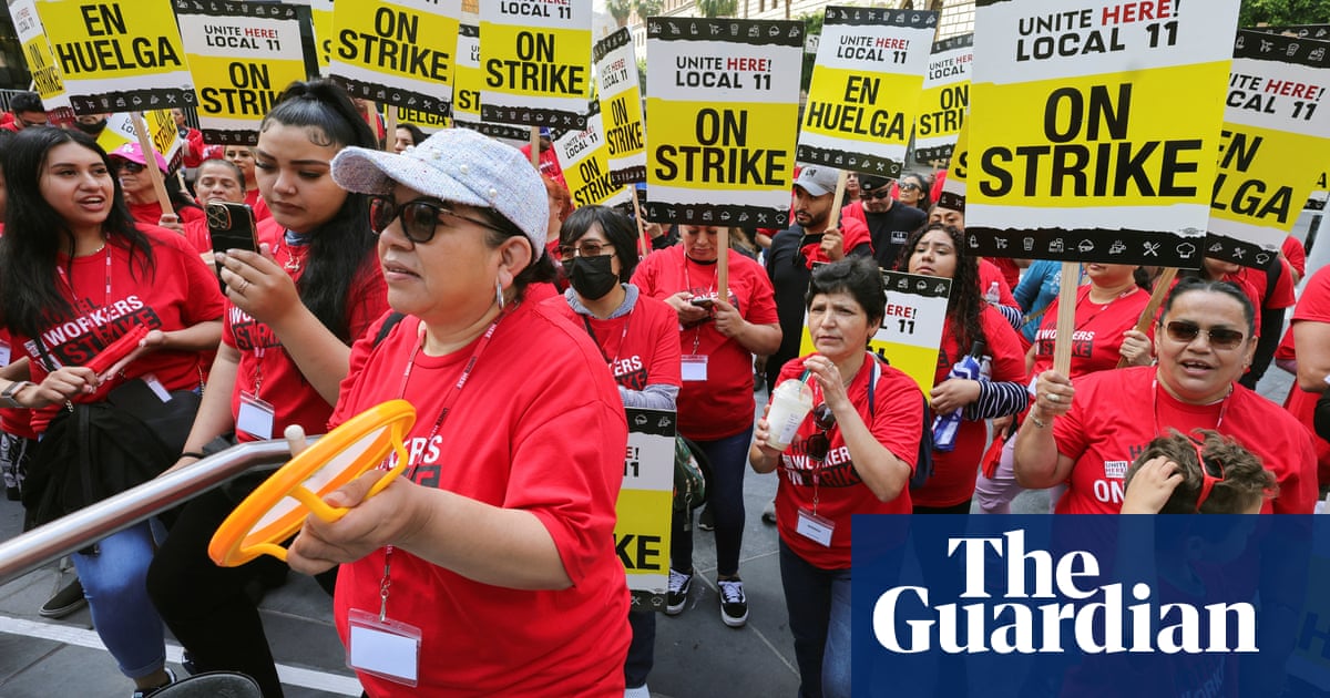 Thousands of hotel workers in LA area begin strike for better pay and benefits