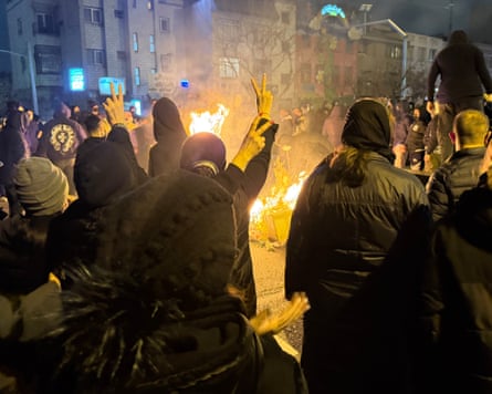 In this photo obtained by the Associated Press, Iranians attend an anti-government protest in Tehran on 9 January.