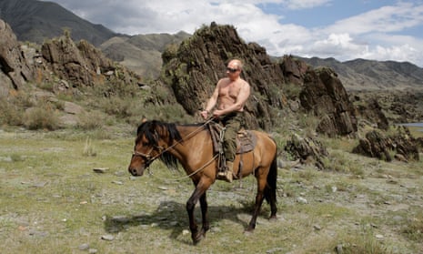Vladimir Putin rides a horse during his holiday in Southern Siberia