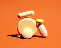 a group of vitamins and pills laid in a pile