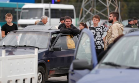 Ukrainian citizens fleeing from occupied parts of eastern Ukraine on Friday
