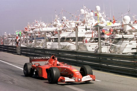 Michael Schumacher celebrates winning in 2001