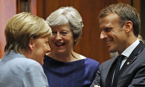 Angela Merkel (left), Theresa May and Emmanuel Macron at the EU summit.