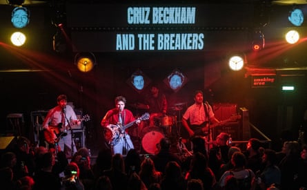 Beckham on stage with his band, the Breakers
