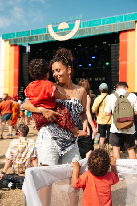 Iman and her children in front of the main stage at Green Man.