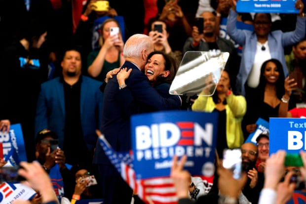 Harris hugs Biden after she endorsed him at a campaign rally in Detroit in March.