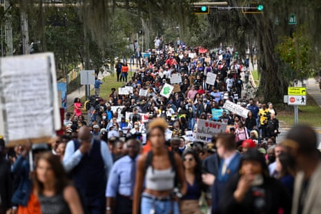 Demonstrators protest Florida Governor Ron DeSantis plan to eliminate Advanced Placement courses on African American studies in high schools.