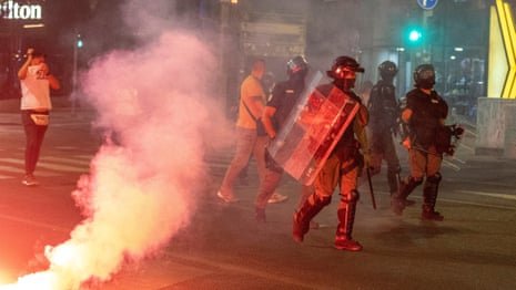 Dozens injured in Serbia as protesters clash with pro-government supporters | Serbia | The Guardian