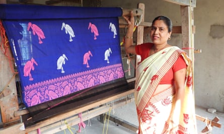 Hargila army member Sarawasti Das is weaving a mekhela chador set with the hargila motif