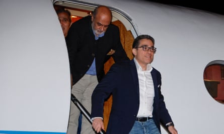 Siamak Namazi, right, and Morad Tahbaz leave the plane after returning to the US on 18 September 2023 as part of a prisoner swap with Iran.
