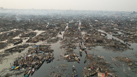 ‘They told us to leave. They didn’t tell us where to go’: the demolitions destroying homes and lives in Lagos Aerial view of floating slum houses with the ones in the foreground destroyed and with broken debris floating on the water