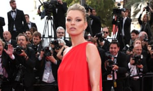 Loving the red carpet: Kate Moss wearing a vintage Halston gown.