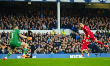 Liverpool's Darwin Nunez has his shot saved by Everton's goalkeeper Jordan Pickford.