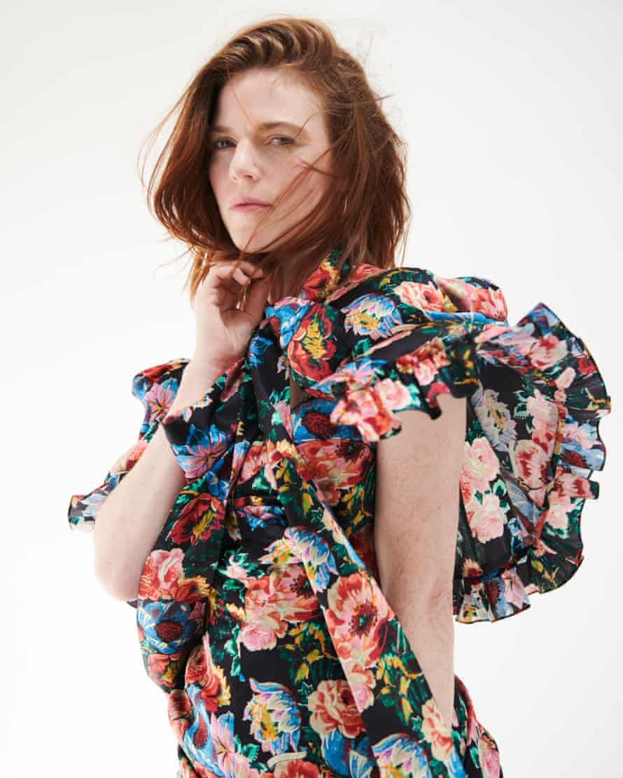 In bloom: Rose Leslie wears dress and cape by thevampireswife.com; and earrings by monicavinader.com.