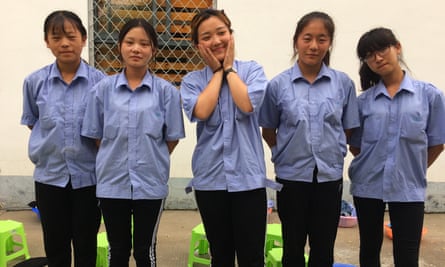 Bing Jiaying, centre, with fellow students, fears she will be at the boot camp for a whole year.