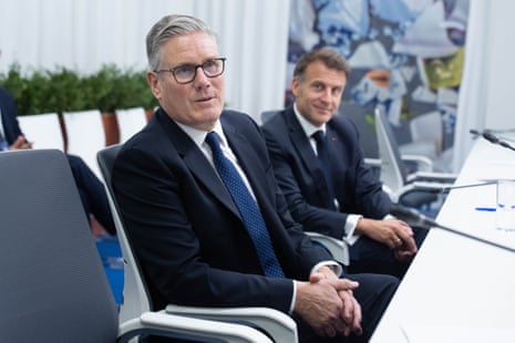 Keir Starmer (left), sitting beside the French president, Emmanuel Macron, at the European Political Community summit in Yerevan, Armenia.