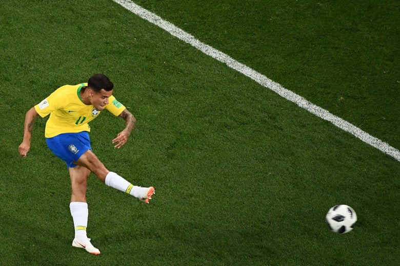 Brazil’s forward Philippe Coutinho curls a shot goalwards.