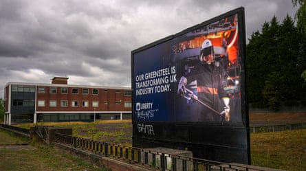 A big sign that says Our GreenSteel is Transforming UK Industry