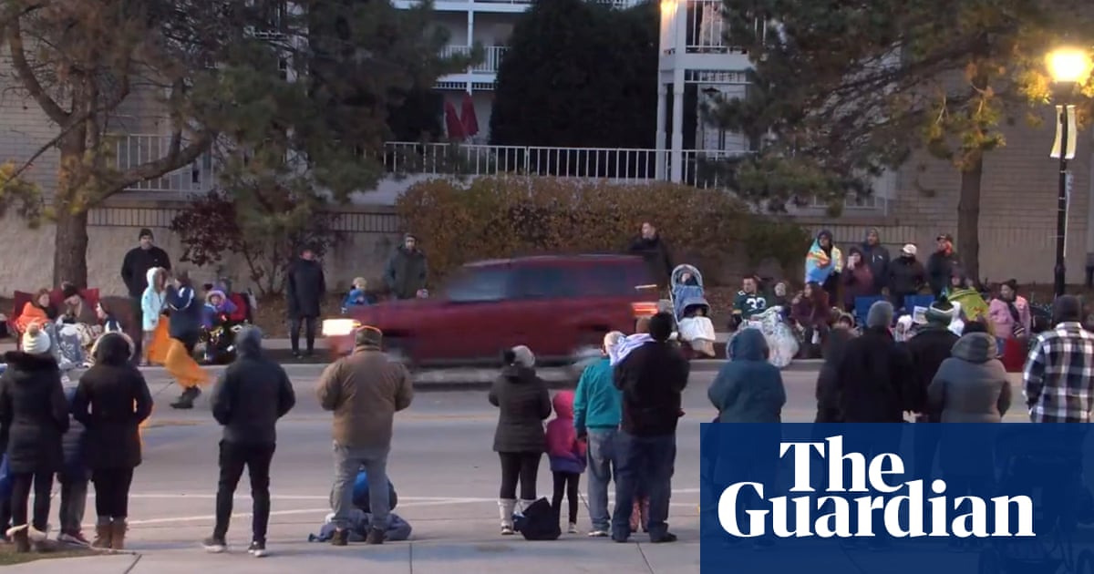 Waukesha Christmas parade: ‘some fatalities’ after car speeds into crowd in Wisconsin