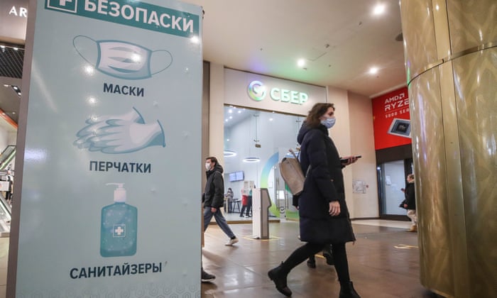 A sign calling on customers to protect themselves by using face masks, gloves and hand sanitiser, at the Galereya shopping and leisure centre.