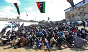 Migrants gather at the Tripoli branch of the Anti-Illegal Immigration Authority.