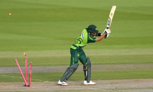 Babar Azam’s stumps are skittled.