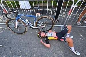 Justine Ghekiere lies flat out after a hard day in the Alps