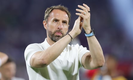 Gareth Southgate claps his hands after the Euro 2024 group stage match between England and Slovenia in Cologne, Germany