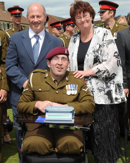 Ben Parkinson in full military uniform in his wheelchair at a military celebration