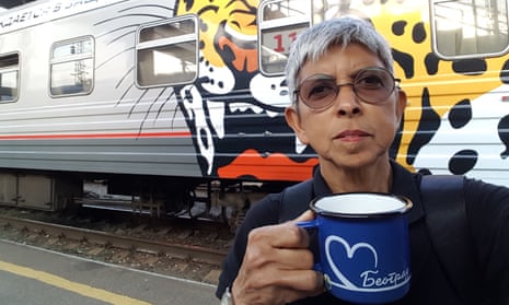 Nooraini Mydin enjoys a coffee during a long stop on her Trans-Siberian journey.