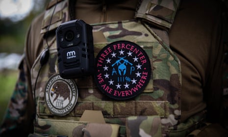 A man wears a Three Percenters patch during a Proud Boys rally in Portland, Oregon, on 26 September 2020. 