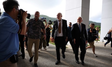 WikiLeaks founder Julian Assange appears at a U.S. District Court in Saipan alongside Kevin Rudd.
