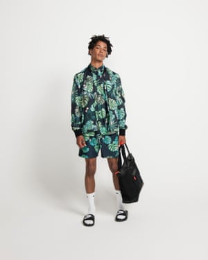 Model in shorts with matching jacket and shirt