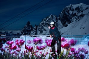 A blooming meadow is projected on to snow-covered landscapes featuring Christian, who has worked on the Mont Blanc cable car system since 1996.