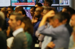 AAP staff react during Tuesday’s announcement that the news wire service will shut down