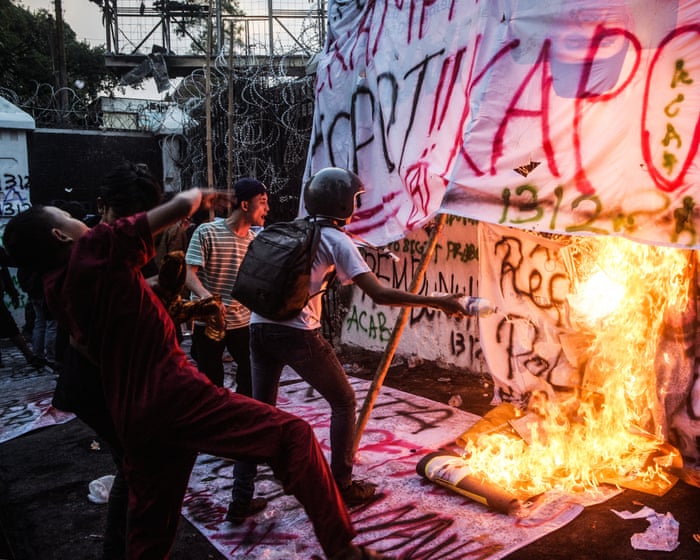 Twenty missing in Indonesia protests, rights group says