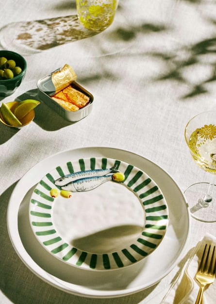 a table with a plate and glasses