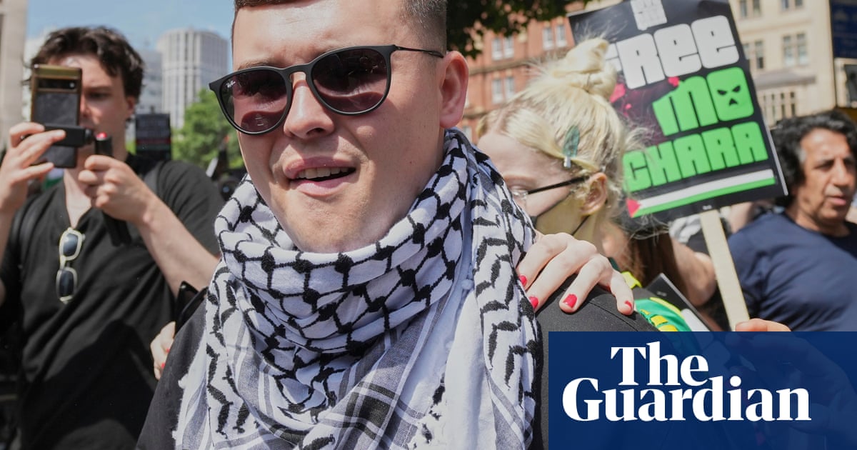 Kneecap rapper charged with terror offence released on unconditional bail