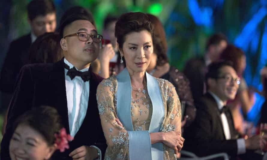 Nico Santos and Michelle Yeoh in Crazy Rich Asians.
