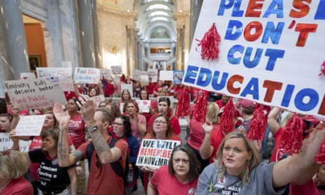 Teachers from across Kentucky gathered inside the state capitol in April of last year to rally for increased funding and to protest changes to their state-funded pension system.