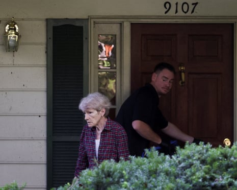 Gretchen Smith Bolton walks away from Bolton's house amid FBI search.