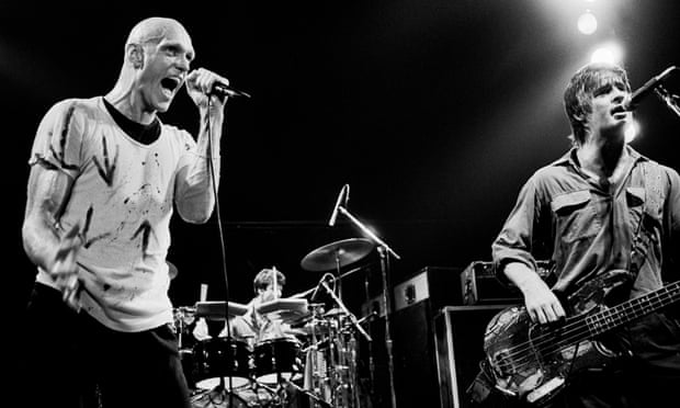 Peter Garrett and Peter Gifford of Midnight Oilperform onstage in Chicago, Illinois, in 1984.