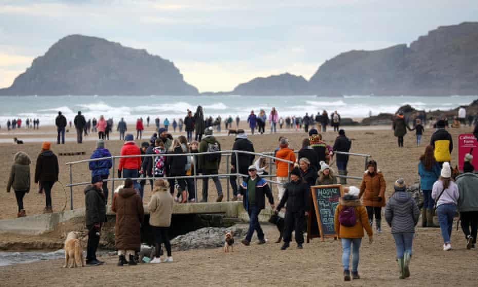 A crowded Perranporth Beach, south of Newquay, on New Year’s Day.