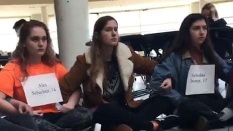 Students turn detention for anti-gun walkout into silent protest – video