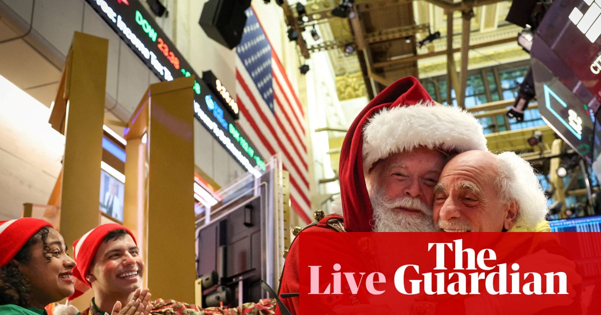 S&P 500 hits record high as Santa rally reaches Wall Street – business live | Business