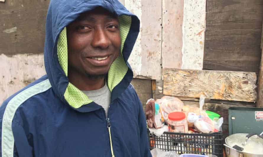 Abdul Karim, a migrant from Ghana, prepares lunch at a shelter in Tijuana, Mexico.
