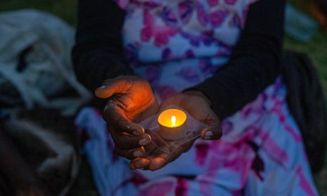 A candle light vigil in front of Alice Springs law courts for Kumanjayi Walker